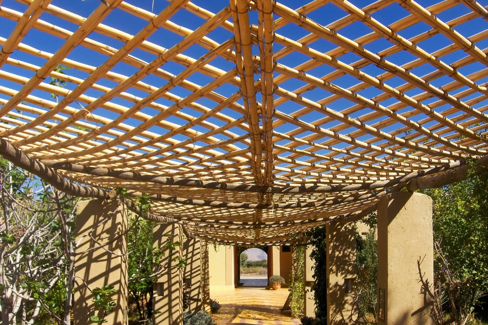 creating enchanting outdoor spaces with wooden pergolas