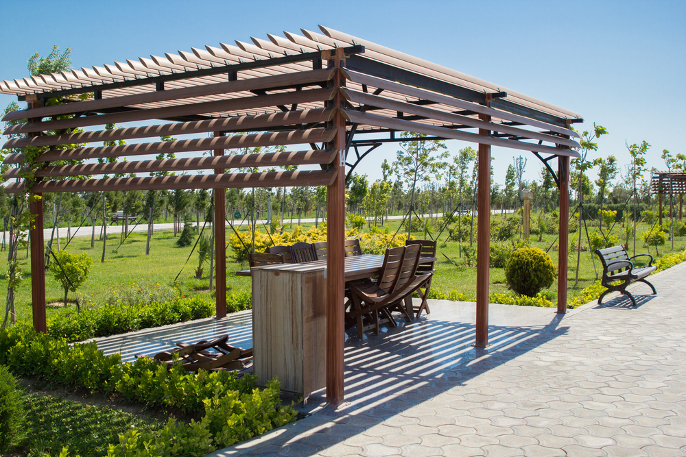 Features and Benefits:

wooden, pergola, in, park, with, wooden, garden, table, and, chairs