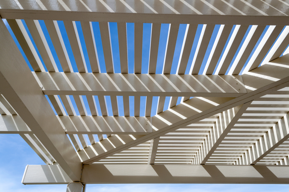 Integrate Pergolas into Your Aesthetic, Harmonise with architecture

white,pergola,and,blue,sky