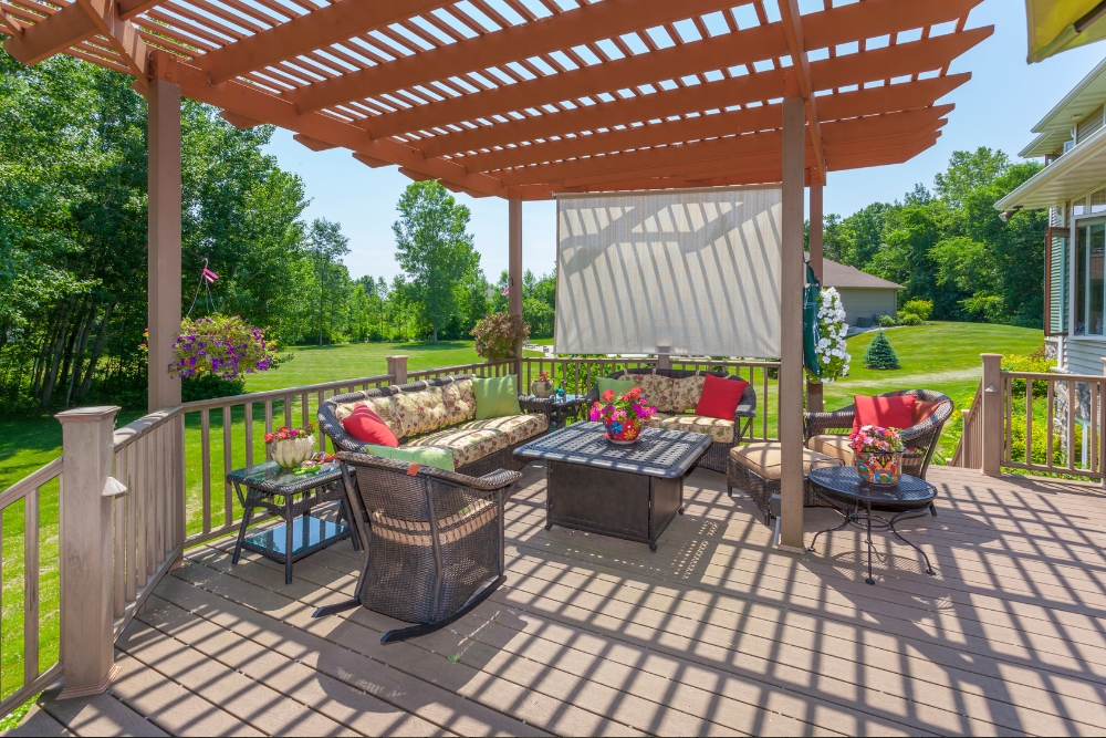 Benefits of Adding Greenery to Your Outdoor Space with a Wooden Pergola